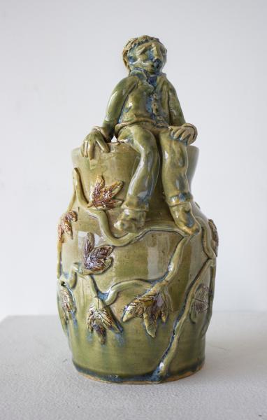 Green Vase with Seated Figure picture