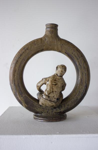 Ring Jug with Seated Figure picture