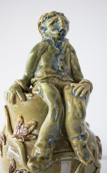 Green Vase with Seated Figure picture