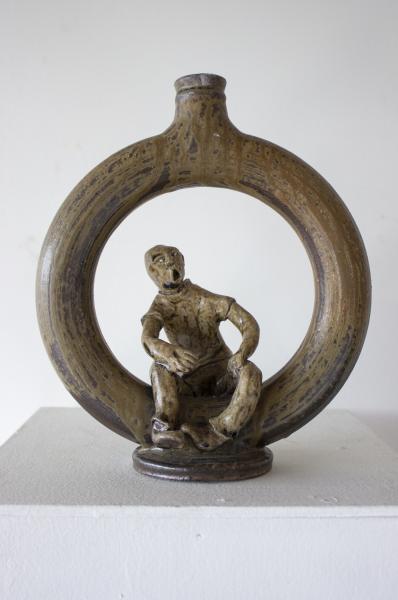 Ring Jug with Seated Figure