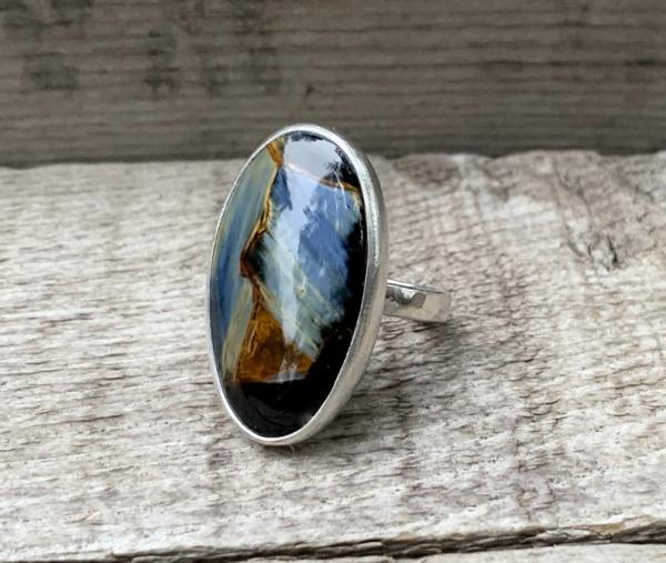 Large Oval Luminescent Shiny Blue and Brown Pietersite Sterling Silver Ring with Hammered Band | Cleansing Stone picture