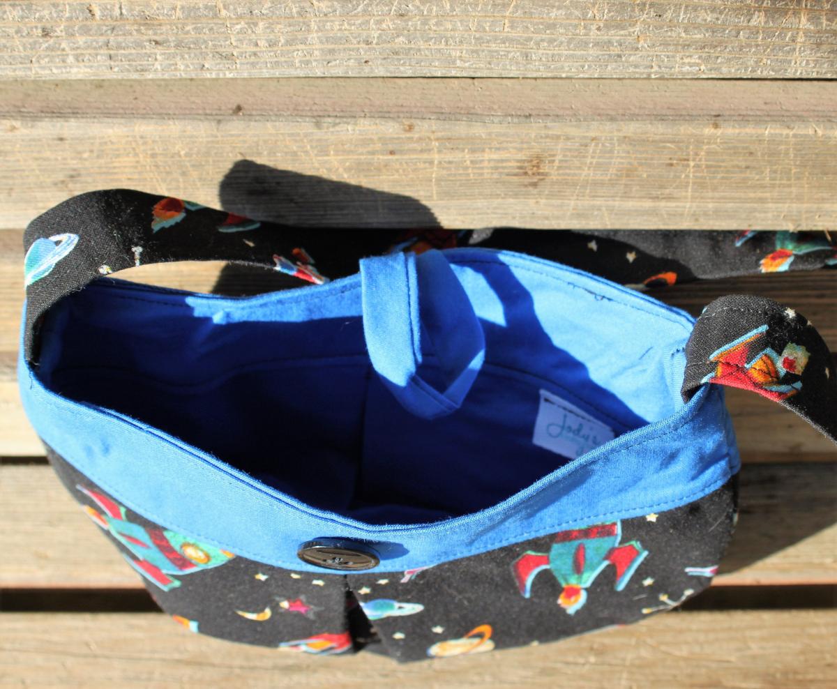 Soar to the stars with this Little girl pleated retro rocket fabric purse  Small bag, child sized.  Lined in Coordinated cotton picture