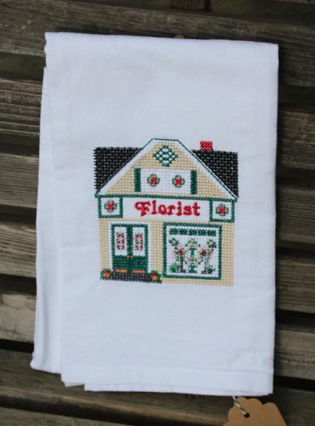 Florist Store in a cross stitch style embroidered on a white tea towel, dish towel, flour sack, cotton, large picture