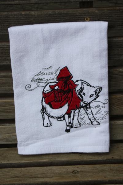 A Beautifully drawn stylized Red Riding Hood is embroidered on a white flour sack tea towel, dish towel, cotton picture