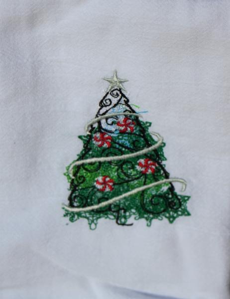 A Beautiful Christmas Tree with Candy cane ornaments is embroidered on a white flour sack tea towel, dish towel, cotton picture