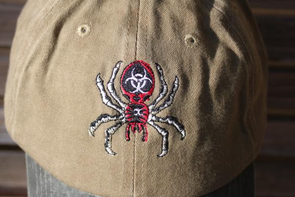 A spider is  Embroidered on a Baseball Hat Cap, Adjustable hat, adult, dad hat, trucker hat picture
