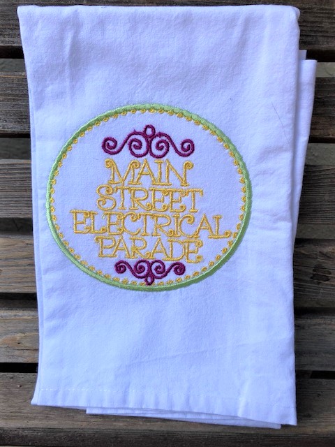 Main Street electrical parade logo embroidered on a white flour sack tea towel, dish towel, cotton, large