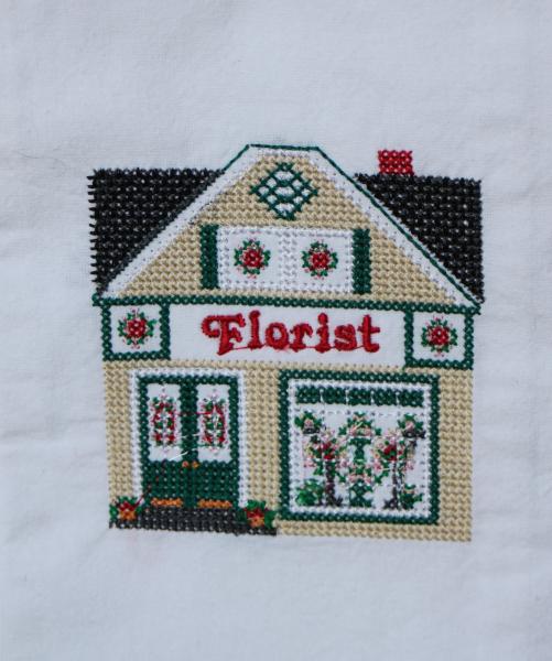 Florist Store in a cross stitch style embroidered on a white tea towel, dish towel, flour sack, cotton, large picture