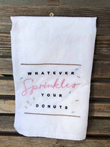 Whatever sprinkles your donuts is embroidered on a white flour sack tea towel, dish towel, cotton picture