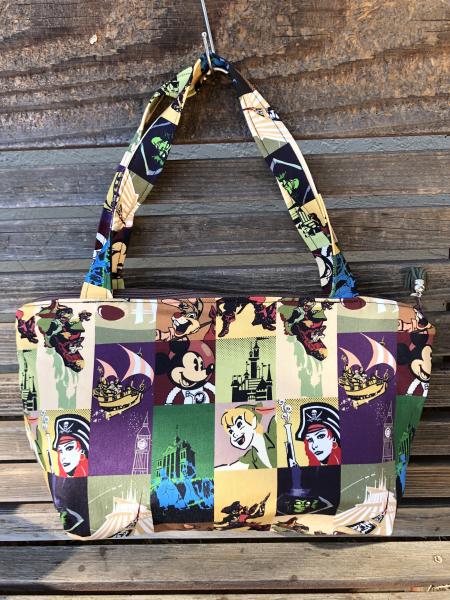 Disney Parks Rides fabric, vinyl lined bag, perfect for snack or lunch, cosmetics, makeup or even as a unique purse or a fun gift bag,