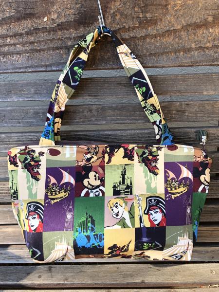 Disney Parks Rides fabric, vinyl lined bag, perfect for snack or lunch, cosmetics, makeup or even as a unique purse or a fun gift bag,