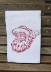 A Beautifully drawn Santa is embroidered on a white flour sack tea towel, dish towel, cotton