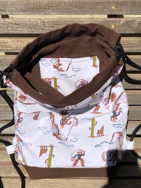 Cowboy Western Drawstring backpack, a fun accessory for any outfit, Canvas lined and bottom for durability, inside pocket picture