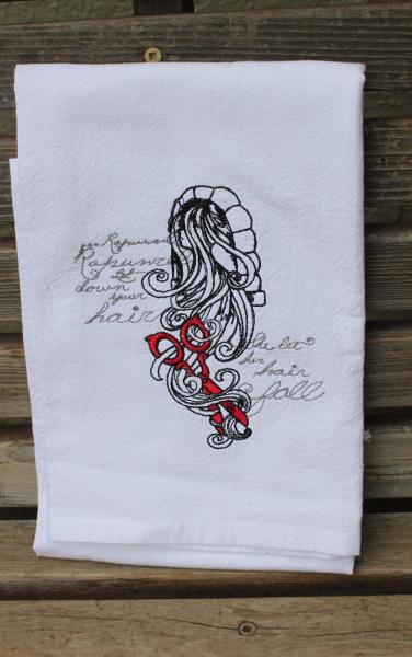 A Beautifully drawn stylized Rapunzel is embroidered on a white flour sack tea towel, dish towel, cotton