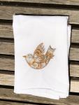 A Christmas Dove is embroidered on a white flour sack tea towel, dish towel, cotton