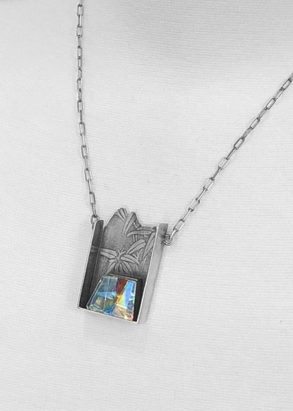 Laminated optical & dichroic glass, cold worked faceted layers, one of a kind, roll printed oxidized sterling silver, sculptural necklace picture