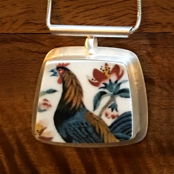 Blue Rooster and Peach Blossoms Portrait Necklace picture