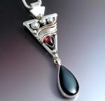 A Triangular Mixed Metal Pendant