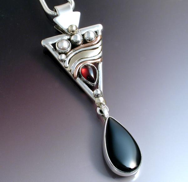 A Triangular Mixed Metal Pendant