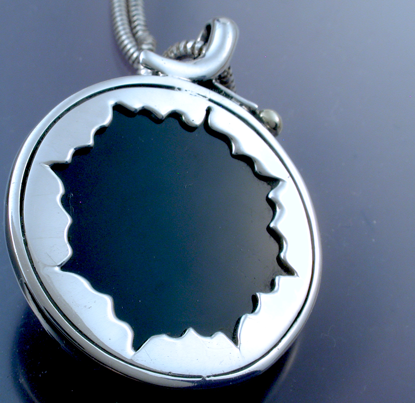 Black Ones Behind Pendant with Garnet picture