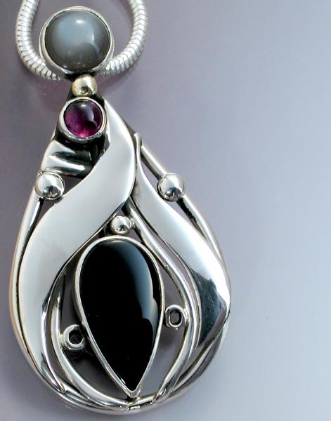 Pendant with Black onyx, moonstone and amethyst