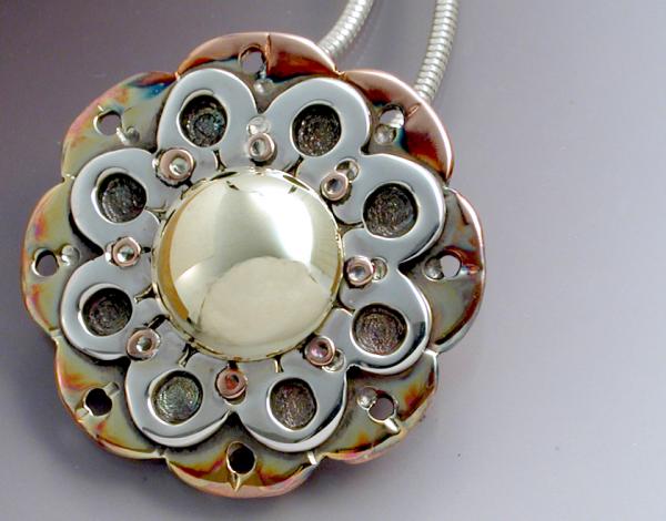 Pendant of Riveted Layers