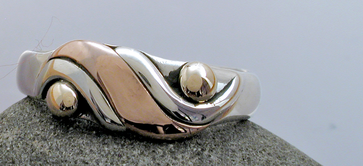 Cross flow ring Silver & Gold picture