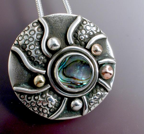 Swirl, an abalone textured pendant