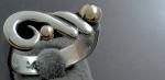 Ring with a Curl