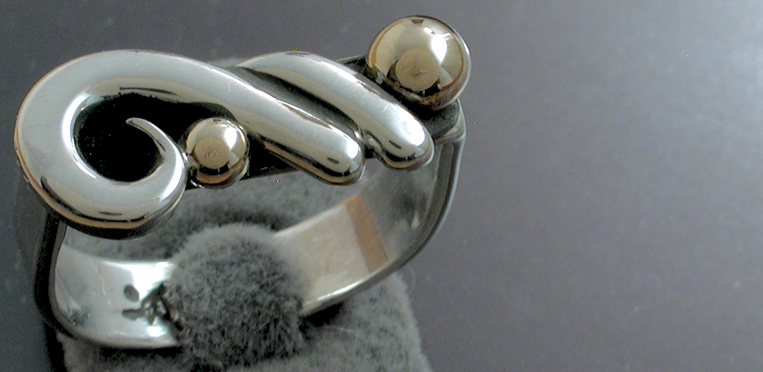 Ring with a Curl