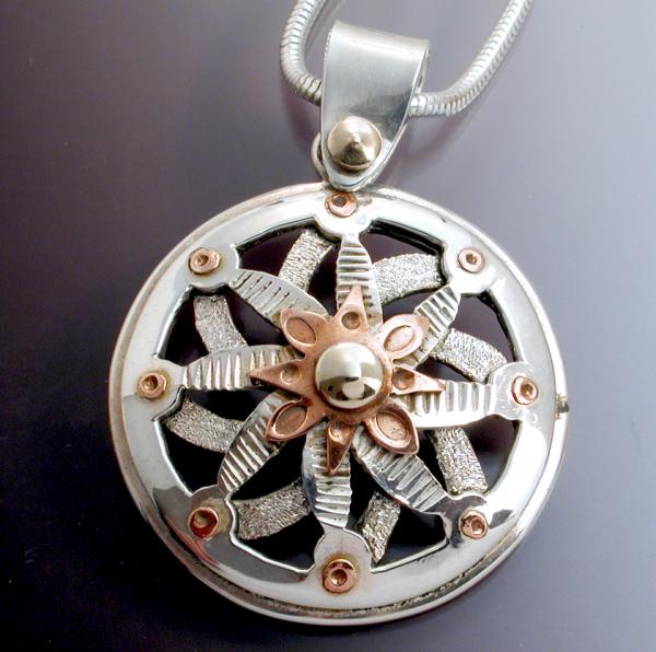 Pierced overlaid flower center pendant