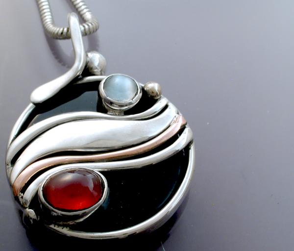 Pendant with a Backset Black Onyx & Garnet & Moonstone