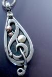 Mixed metal Treble Clef
