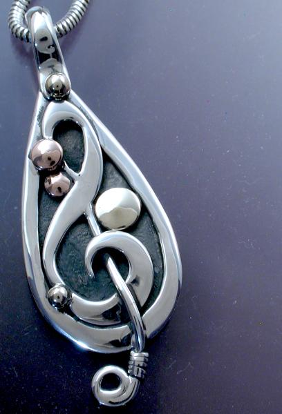 Mixed metal Treble Clef