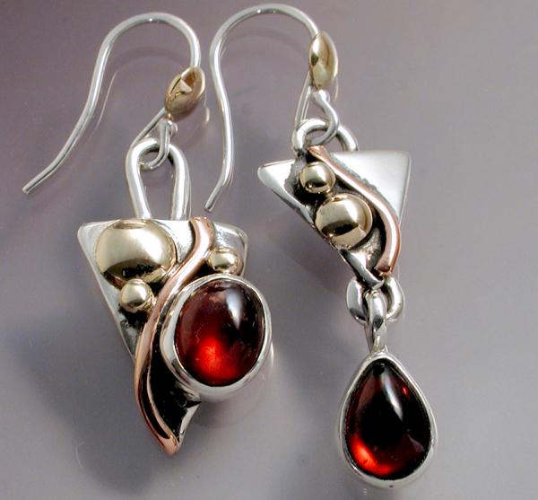 Asymmetrical mixed metal garnet earrings