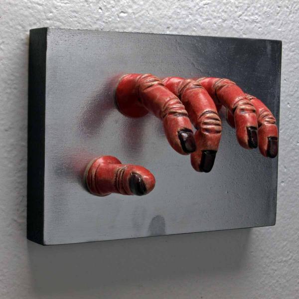 Red Grasping Wall Sculpture picture