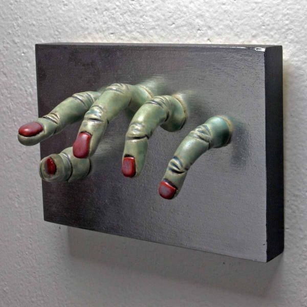 Green Grasping Wall Sculpture picture