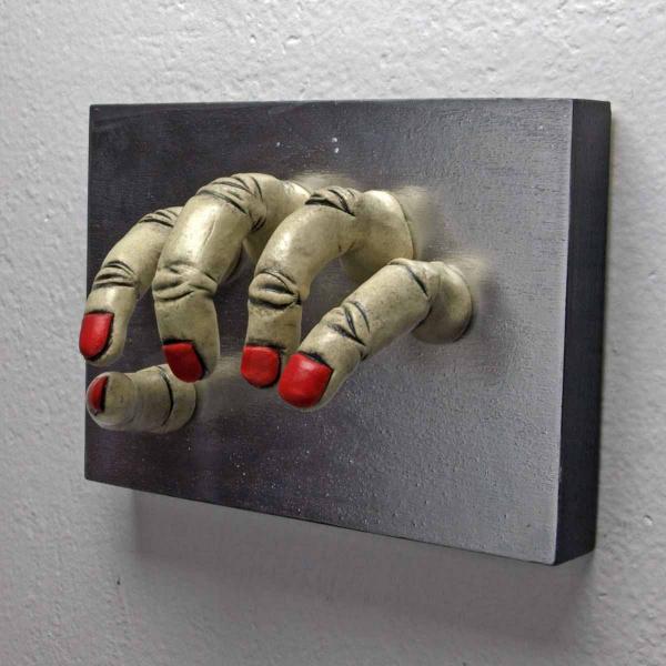 White With Red Nails Grasping Wall Sculpture picture