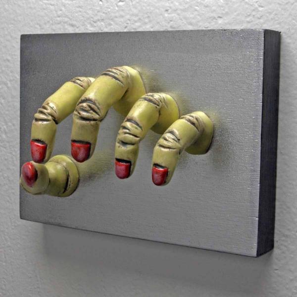 Yellow Grasping Wall Sculpture picture