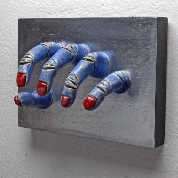 Blue Grasping Wall Sculpture picture
