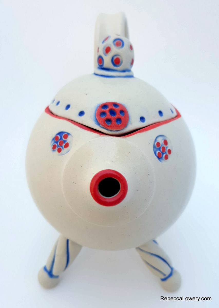 Tripod Teapot, a whimsical ceramic teapot with tripod base, rattle lid picture