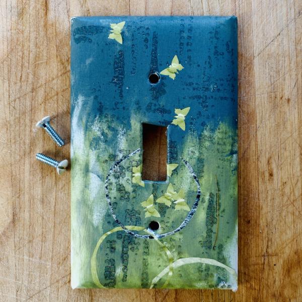 "Upward Mobility" Switch Plate