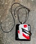 Black red and white glass pendant