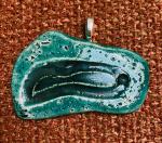 jade colored ceramic pendant