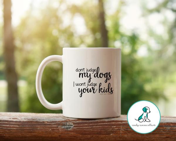 Don't Judge My Dogs I won't Judge your Kids Mug picture