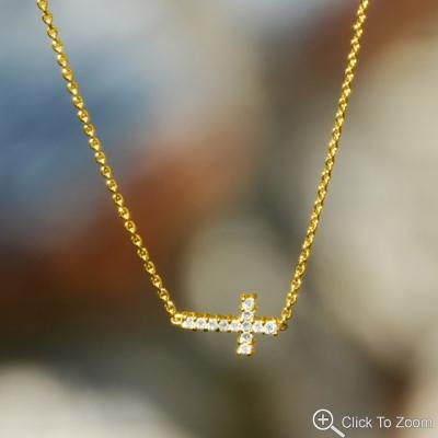 Tiny Gold Sideways Cross Necklace with CZ's picture