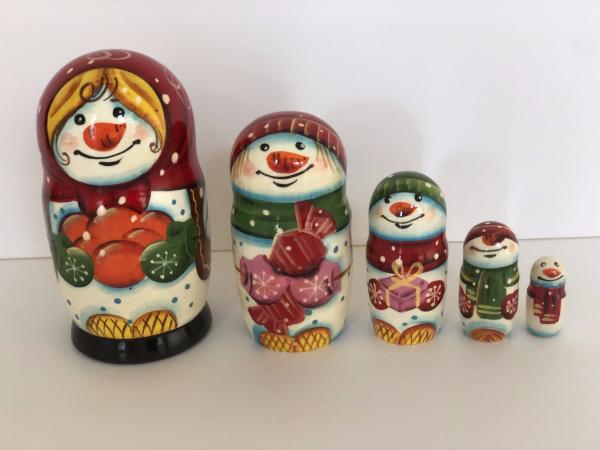 Snow Girl with oranges 5 peace's nesting dolls picture