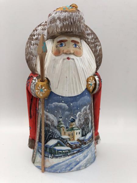 Santa Figure with the Christmas Tree and Church picture