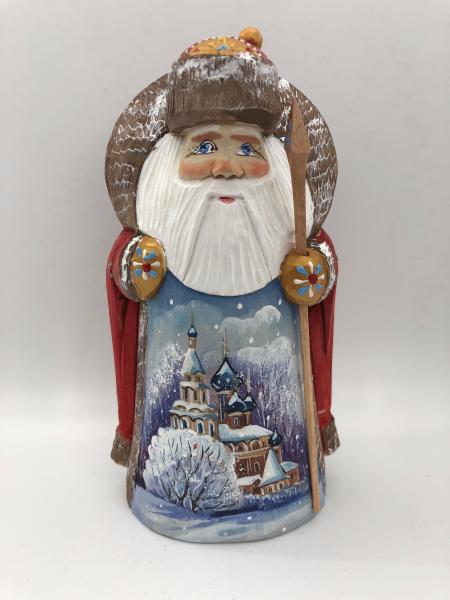 Santa Figure with the Christmas Tree and Church picture