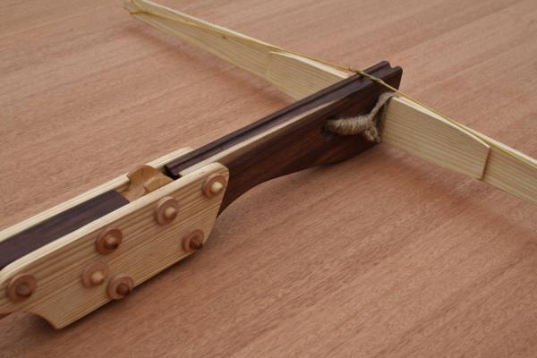Wooden Crossbow-HES Grip- Handcrafted from Walnut and One Padded Bolt picture